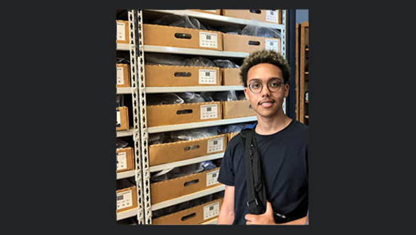 Intern Amadou Agne in the Polar Rock Repository