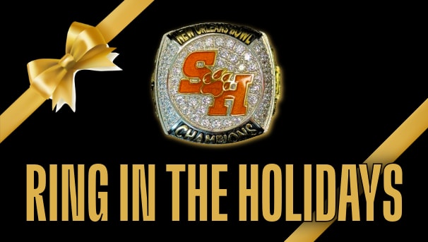 Image of New Orleans bowl ring on a black background