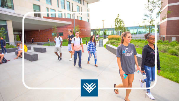 UMass Boston students walking from University Hall