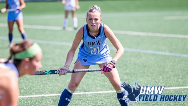 UMW Field hockey player going after the ball on the field