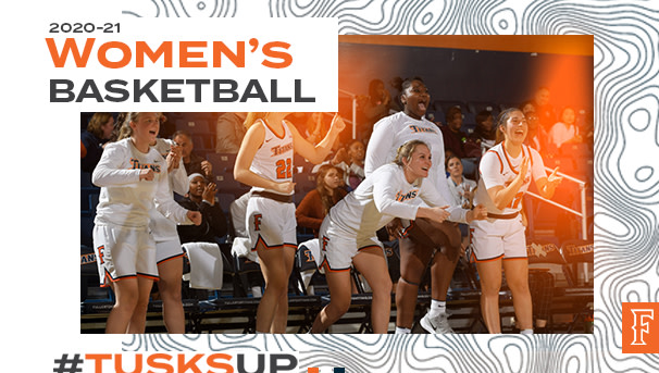 2020-21 Women's Basketball. Image of WBB team cheering on bench. #TusksUp