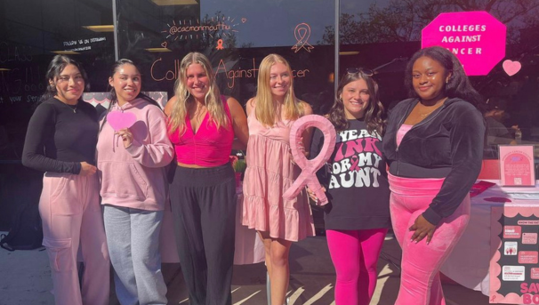 CAC members tabling during Breast Cancer Awareness Month