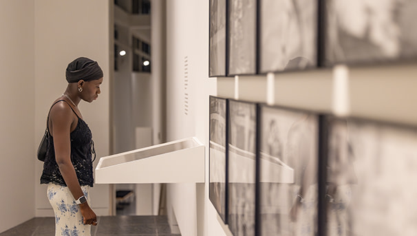 Guest looking at an arts display
