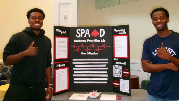 Students Providing Aid Image