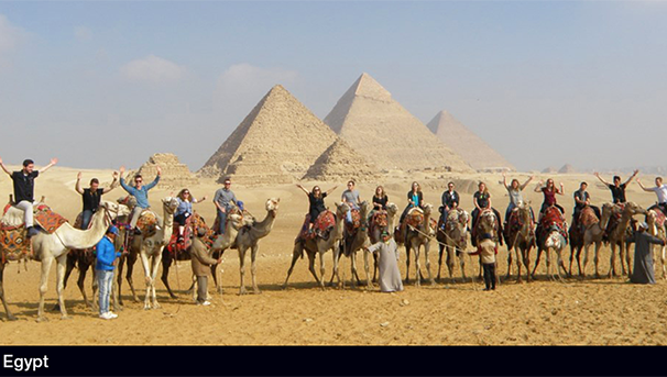 Students riding the camels of Egypt.