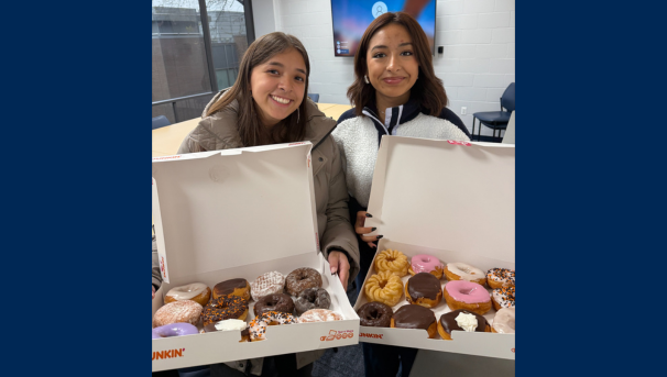 HR Club members with treats at a club meeting