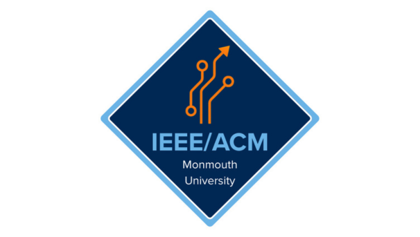 Group of Monmouth IEEE/ACM members posing in Edison Hall after an event