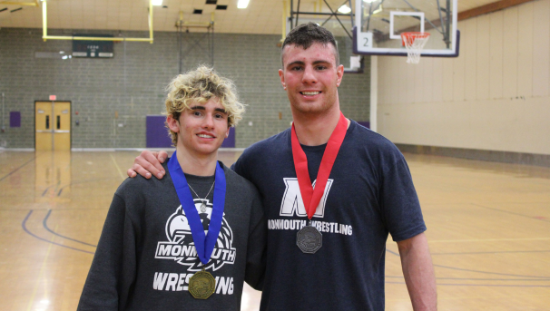 Wrestlers John and Luke posing with their medals