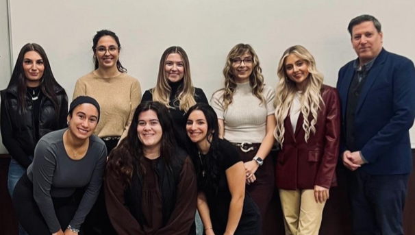 Group of members and an advisor after an event