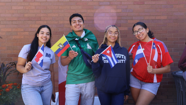 LASO members smiling with flags