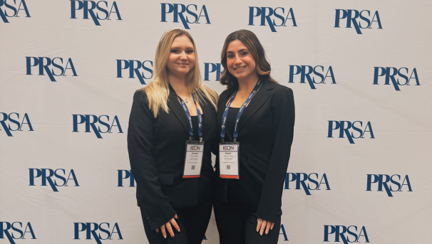 2 female club members at PR conference