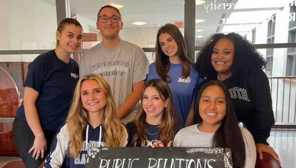 Group of PRSSA members meeting in the Plangere Center on campus