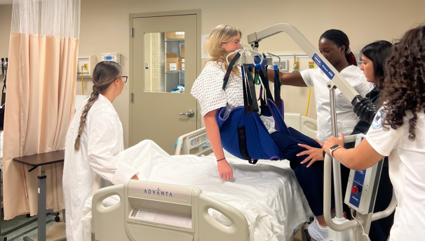 MUPNA members using equipment in the simulation lab