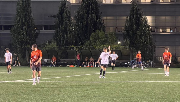 action shot of students playing against another team