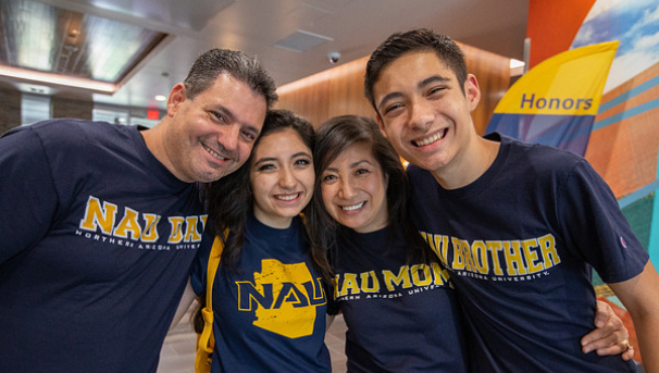 Family of four smiling