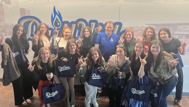 Students at Tulsa Drillers Stadium for Q&A panel about sports PR.