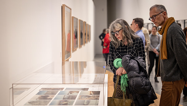 Guests looking at an arts display