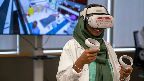 Students watching a demonstration in a science lab