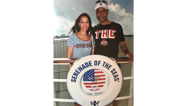 Two individuals stand behind a Serenade of the Seas, Key West photo op