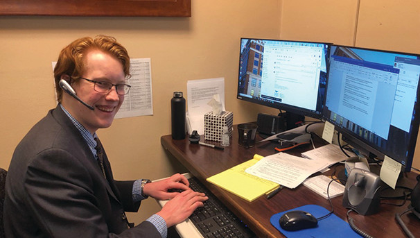 2019 Ted Stevens Legislative Intern, Stuart, at his desk.