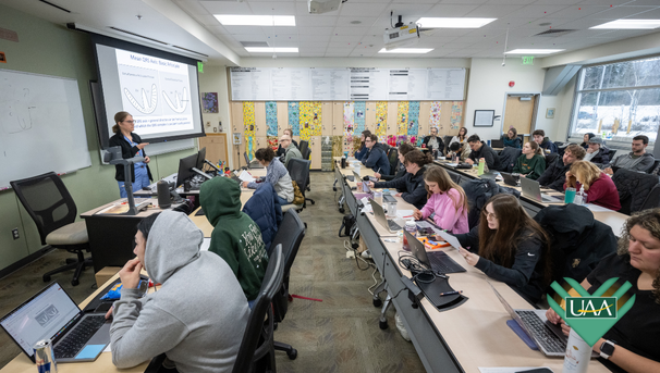 UAA students engage in a STEM lecture, learning through research and innovation.