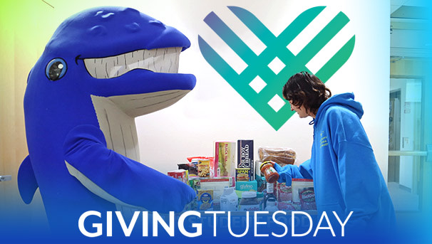 Mascot Spike and student looking at Food Pantry Items