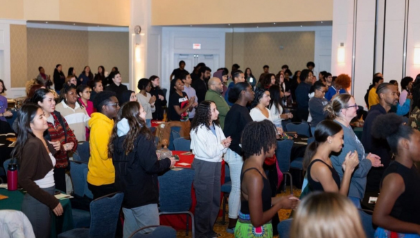 Large group of people standing in Chandler Ballroom