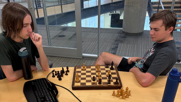 Two students in a chess match