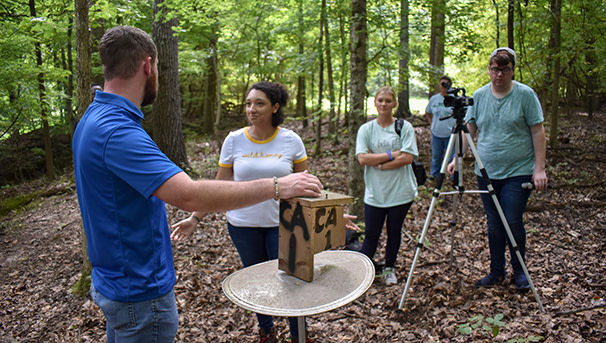 Students record video using a HD video camera.