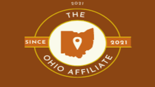 The OH-NBASLH with oranges and yellow. Behind it is a burnt orange background