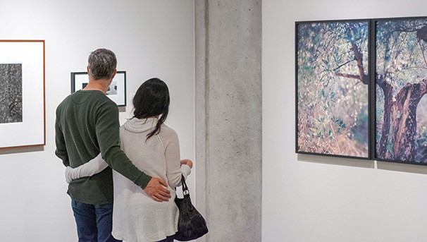 Woman viewing print at CCP event