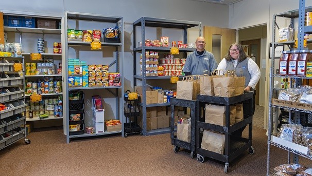 Two people in the Ohio State Newark Food Pantry
