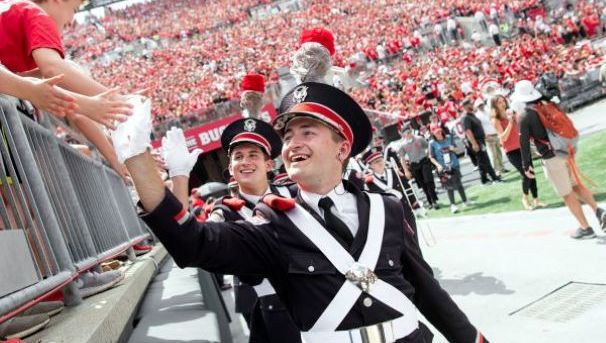Band students walking onto the field