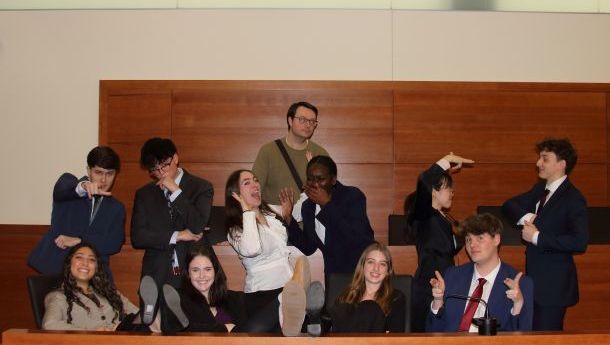 Mock trial team with silly poses 2