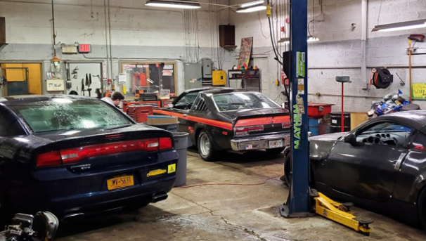 Cars inside the Rensselaer Student Auto Shop