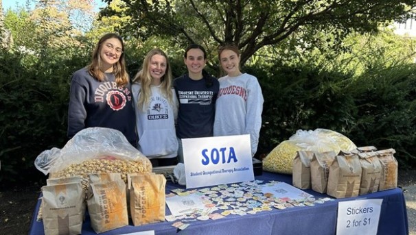 group of students tabling