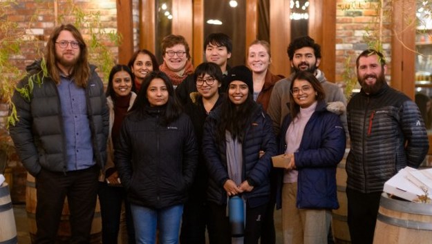 Student's out to dinner with Dr. Peter Henry (Fall 2022)