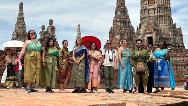 Wearing traditional Thai outfits