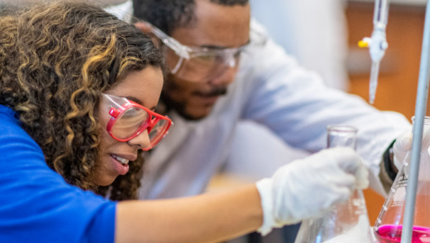 Two students in a chemistry lab