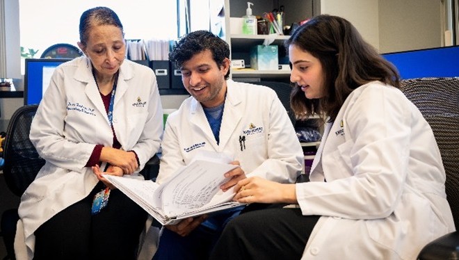 a visiting postdoctoral fellow and the clinical research team