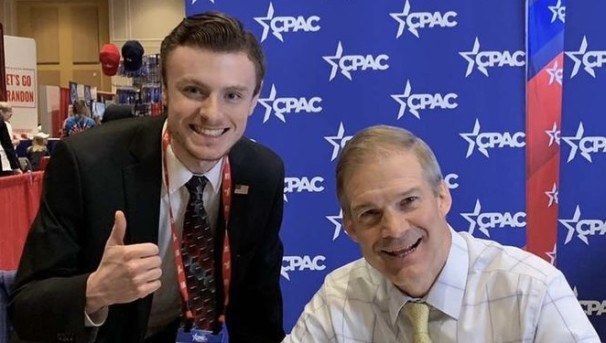 Two people smiling at CPAC event