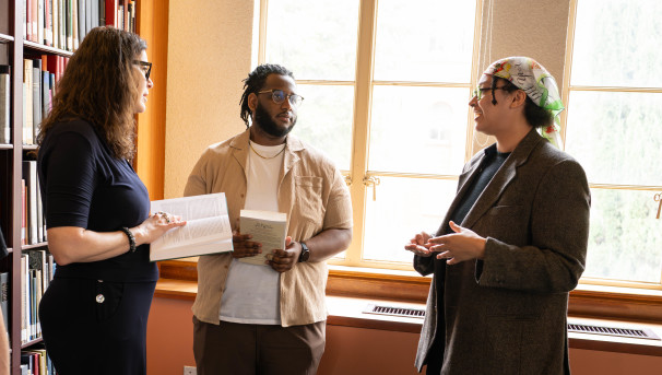 Professor Kara Cooney conversing with students in UCLA's Royce Reading Room