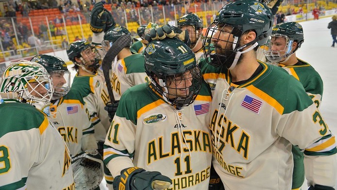 Seawolf Hockey team huddle during a game on October 14, 2014, UAA vs Wisconsin
