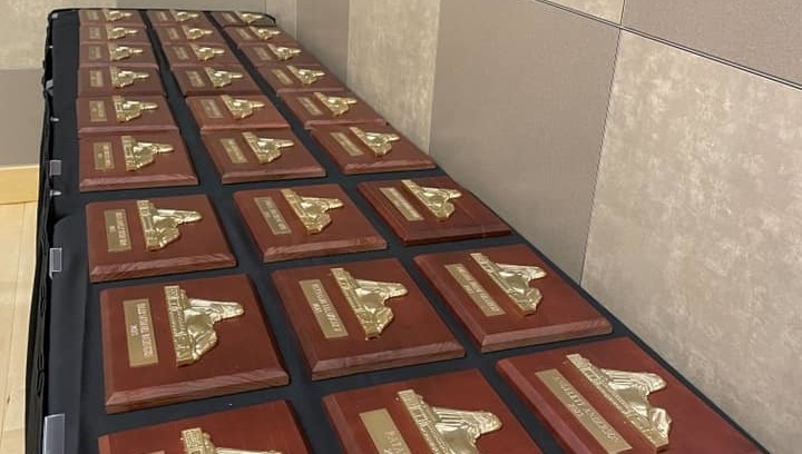 A gold plated Sphinx pin