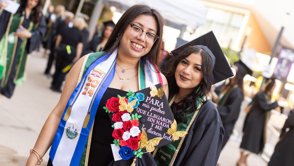 Graduates with decorated grad caps