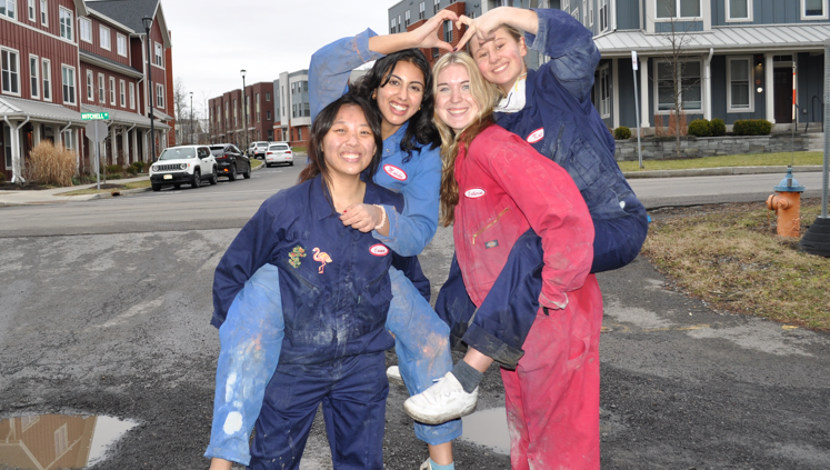 Mix and Mold team members celebrating after finishing the competition cast on Cast Day 2024.