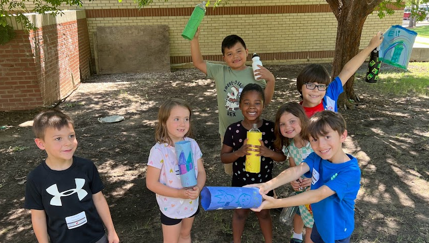 Young kids with their bottle rockets