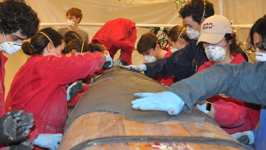 Cast Day 2024 - Mold sub-team creating competition canoe.