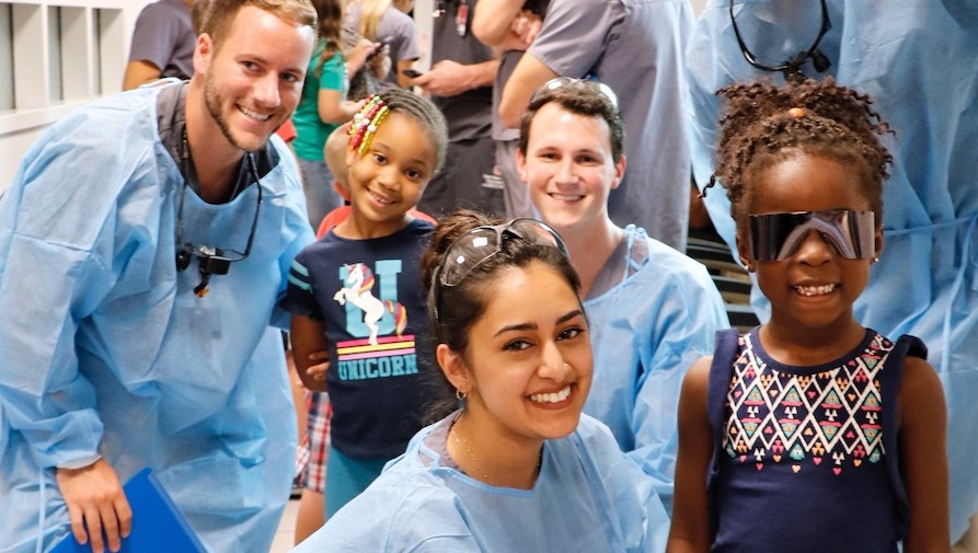 Leadership Team members smiling towards the camera