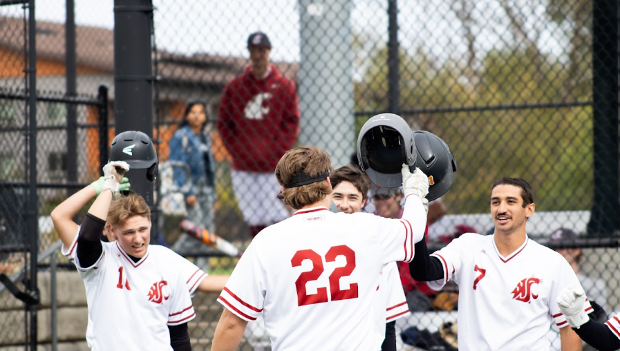 Parker Mann Celebrating with Team After a Homerun